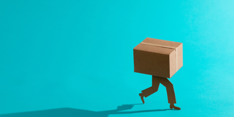 Cardboard box with legs walking away, representing freight at risk of cargo theft